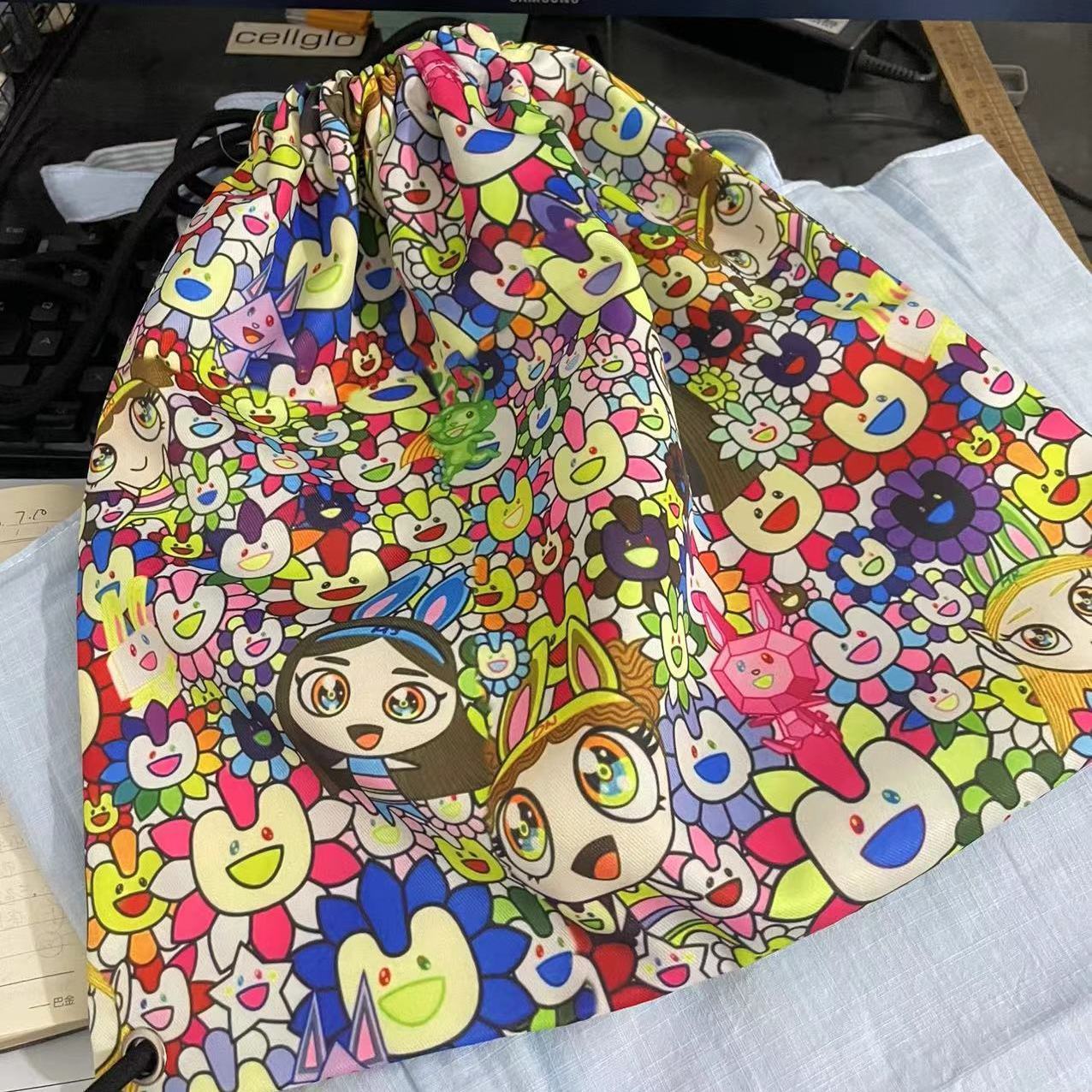 NJZ NEWJEANS DRAWSTRING BAG MERCH